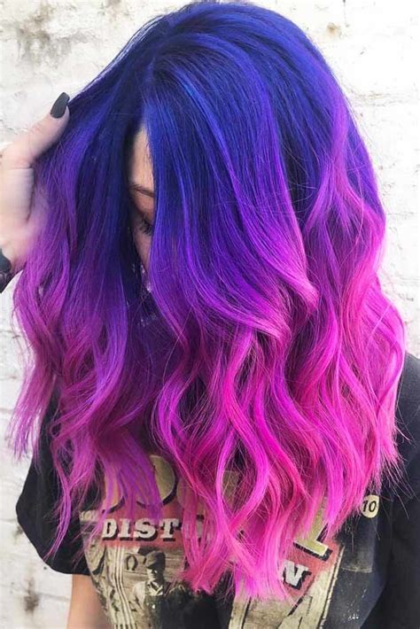 As if an asymmetrical bob isnt bold enough, this look takes it one step further with ultra-dimensional blue and green dye. . Ombre hair purple pink